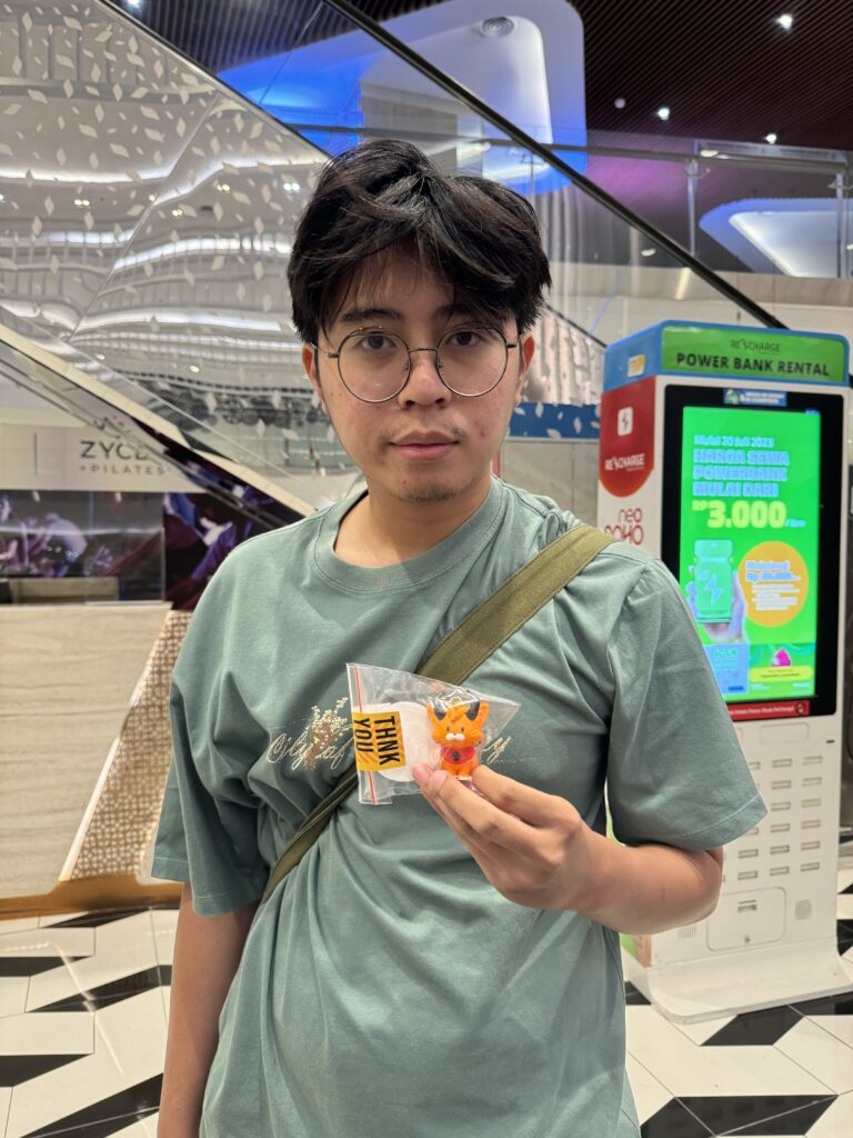 man buys nugget keychain